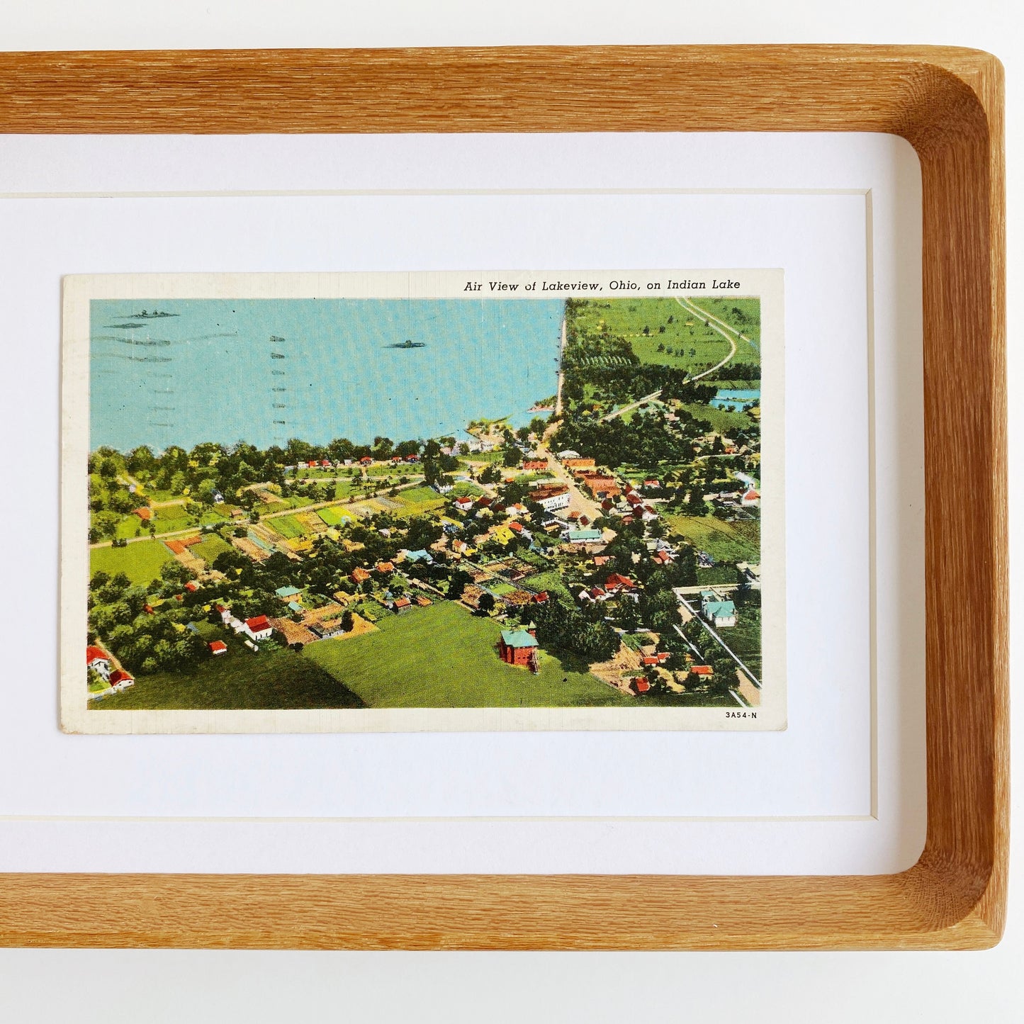 framed indian lake shoreline vintage postcard