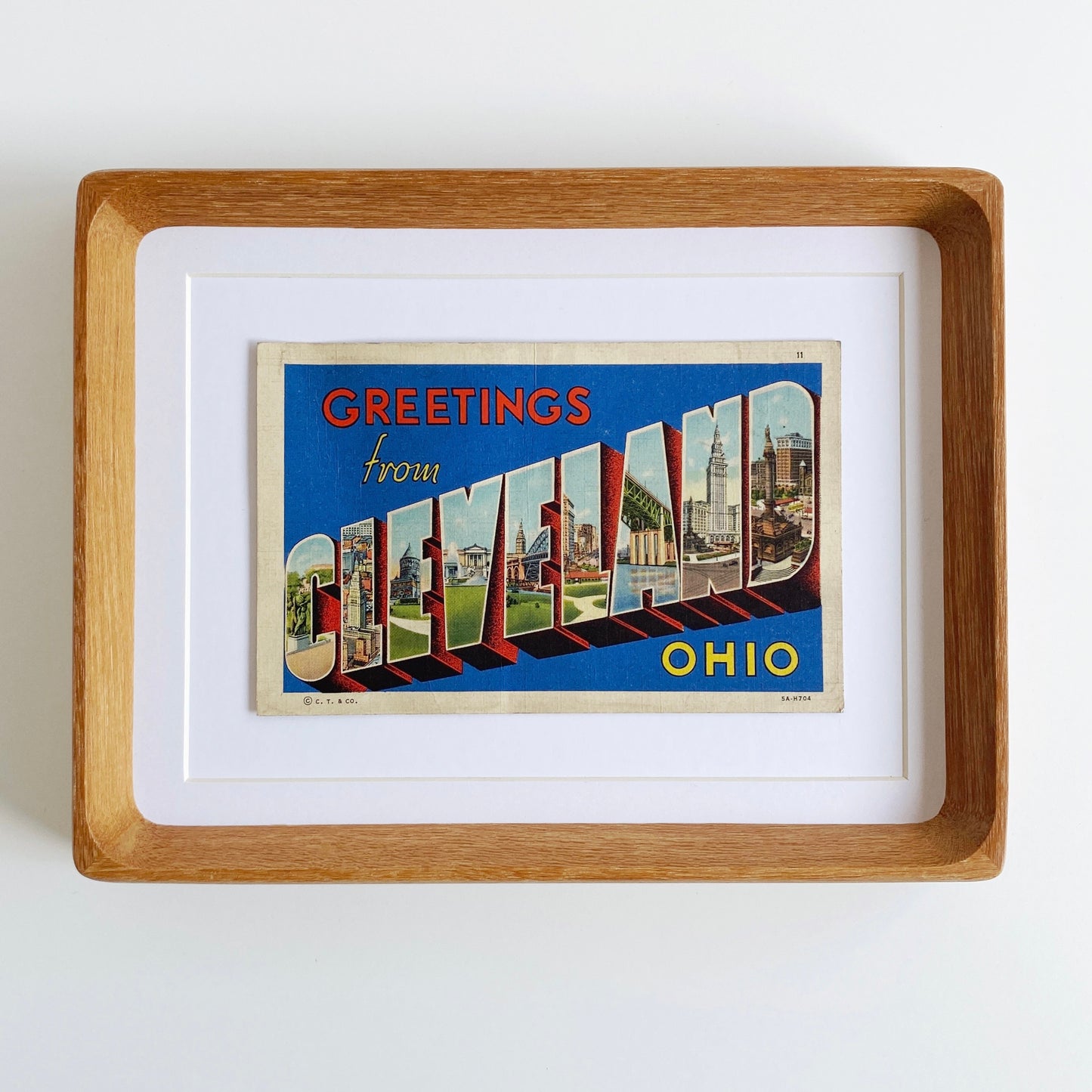 framed greetings from cleveland vintage postcard