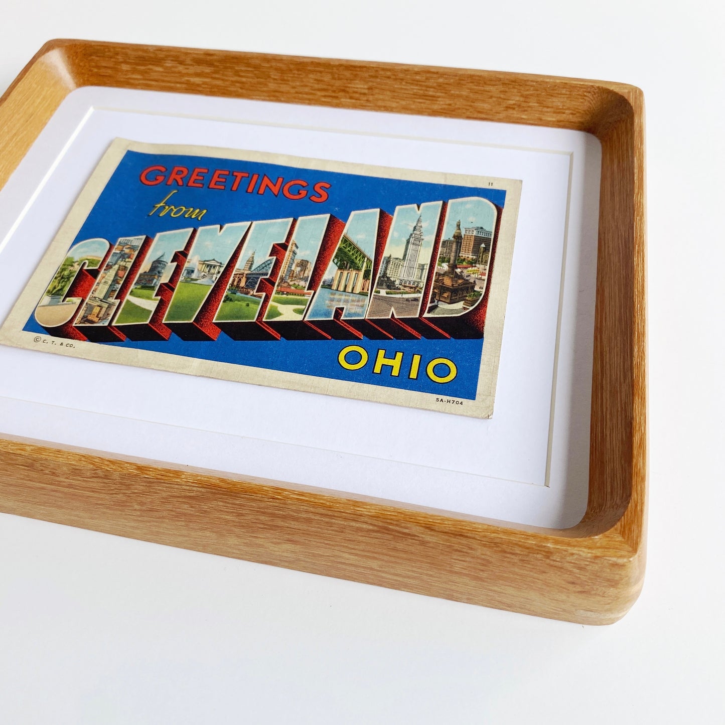 framed greetings from cleveland vintage postcard